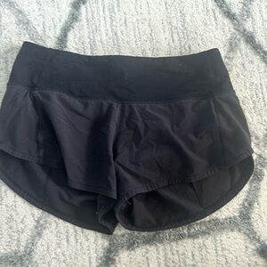 Size 0 lulu shorts.  Worn but still work for young girls.